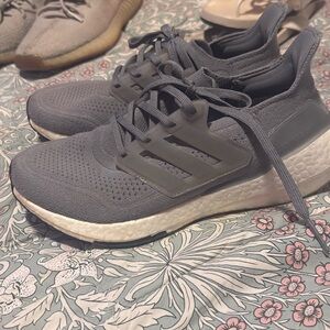 Women’s adidas grey boost tennis shoes.